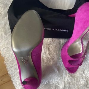 Brand new, never worn.  Hot pink suede, open toe heels.  Dust bag included